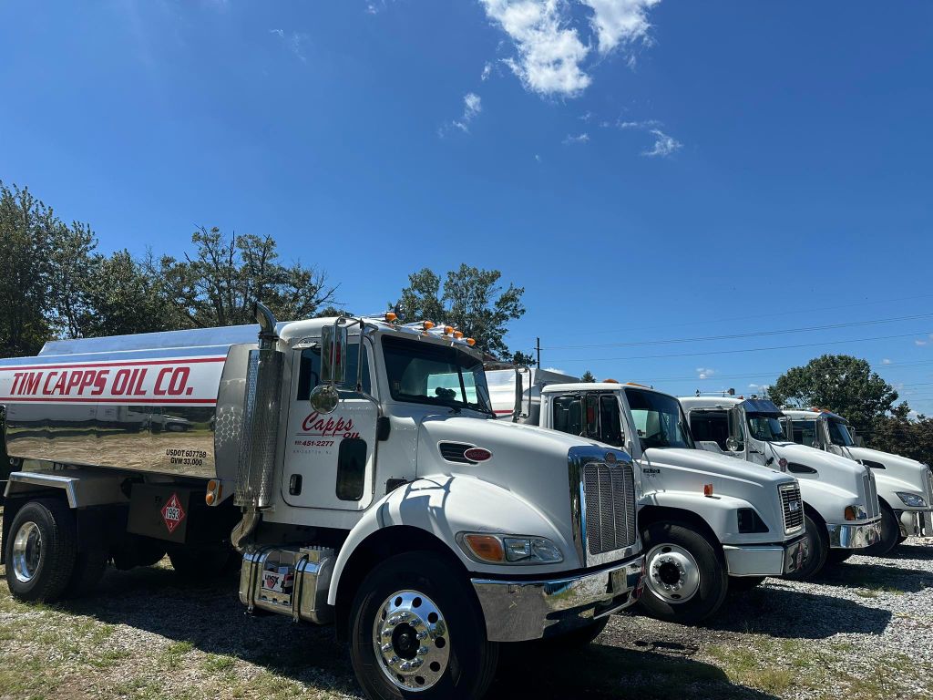 Tim Capps Fuel Oil Co. delivery trucks in yard — South Jersey fleet